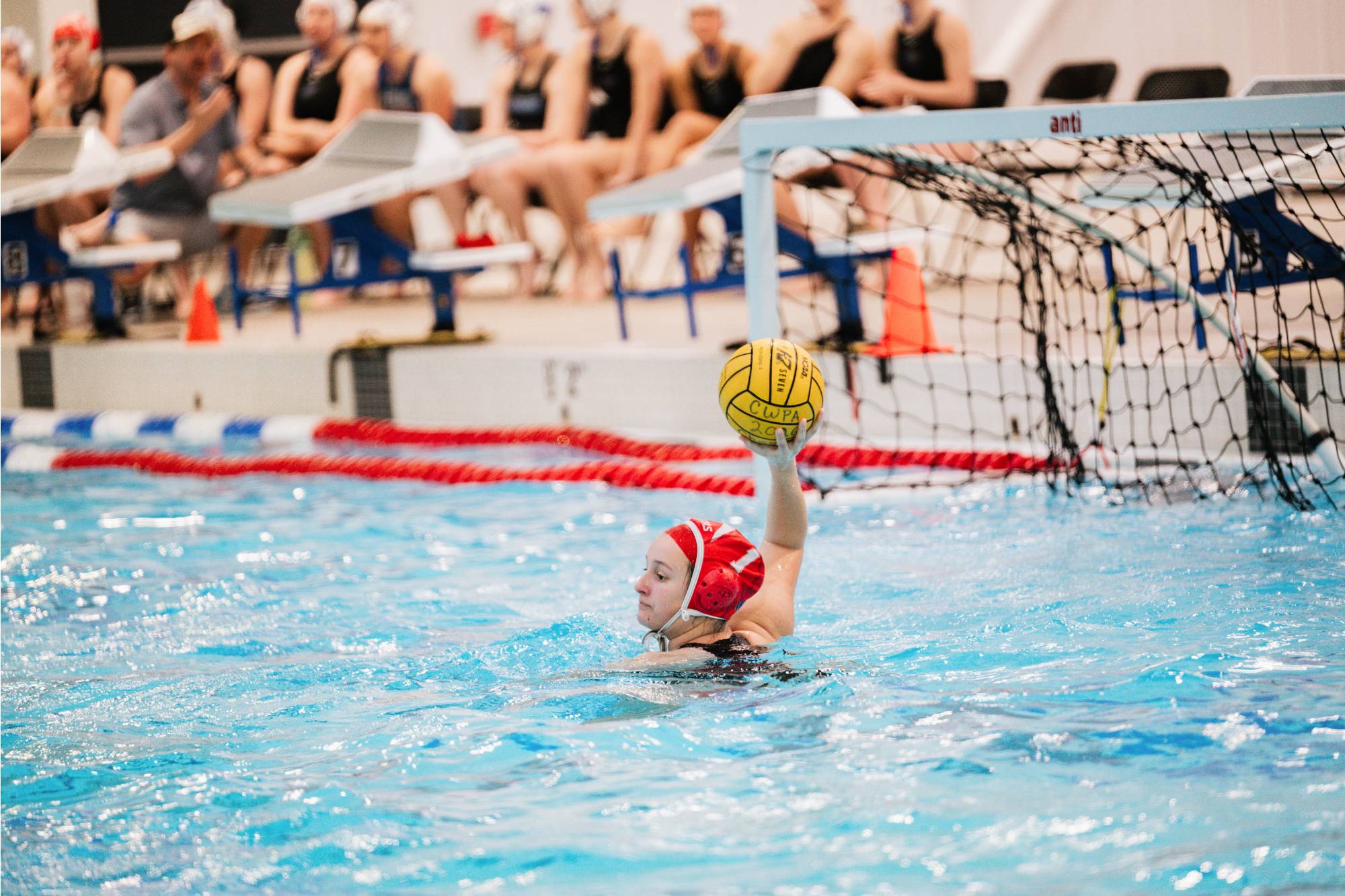 Goalie passes the ball up the pool